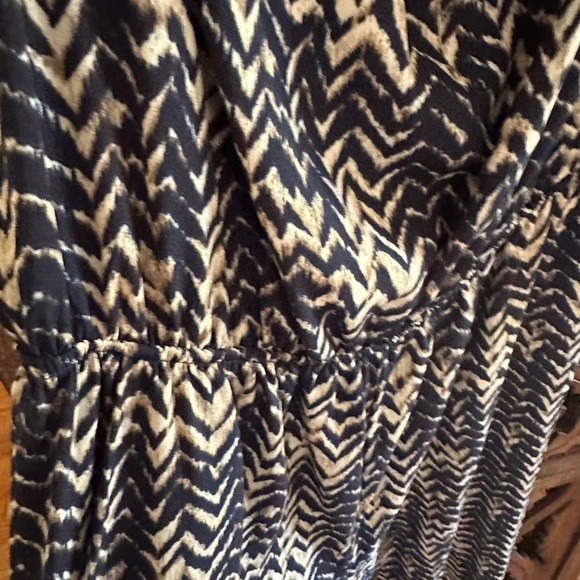 One piece jumpsuit.  Fits like a small medium. - Picture 2 of 8